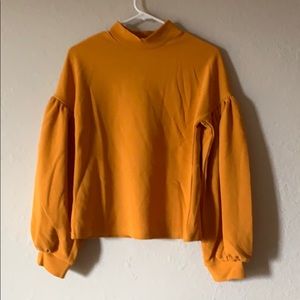 Lantern sleeve mock neck top w/ back button detail